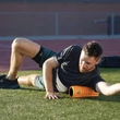 Kép 4/4 - TriggerPoint Grid Travel Foam Roller utazáshoz 25x10cm narancs